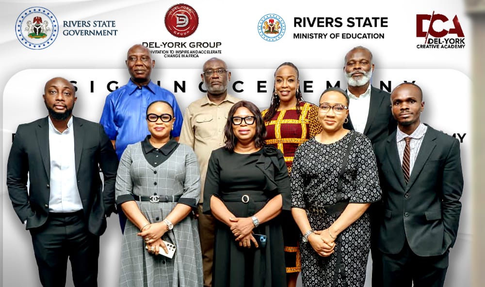 Back row: Hon. Commissioner for Education Dr. Ovy Chinedum Chukwuma, Hon. Attorney General Dagogo Israel Iboroma SAN, and Mr. Ikenna Oguike, Chief Operations Officer of Del-York Group, along with Ms. Stella Fubara, Managing Director of Del-York Development Company. Front row: Ministry of Justice HOD Mrs. Elizabeth Ogan with the legal team at the signing ceremony for the Rivers State Del-York Vocational & Creative Institute.